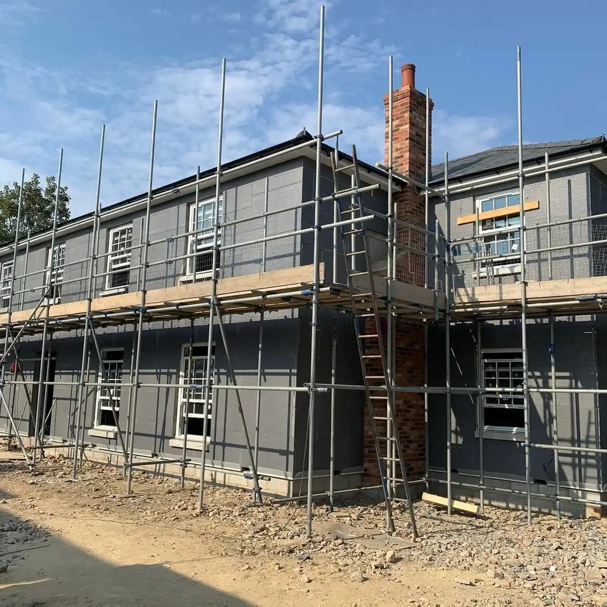 Exterior improvements work in progress with scaffolding in Essex