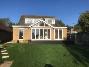 Brick rear extension with glazed doors in Essex
