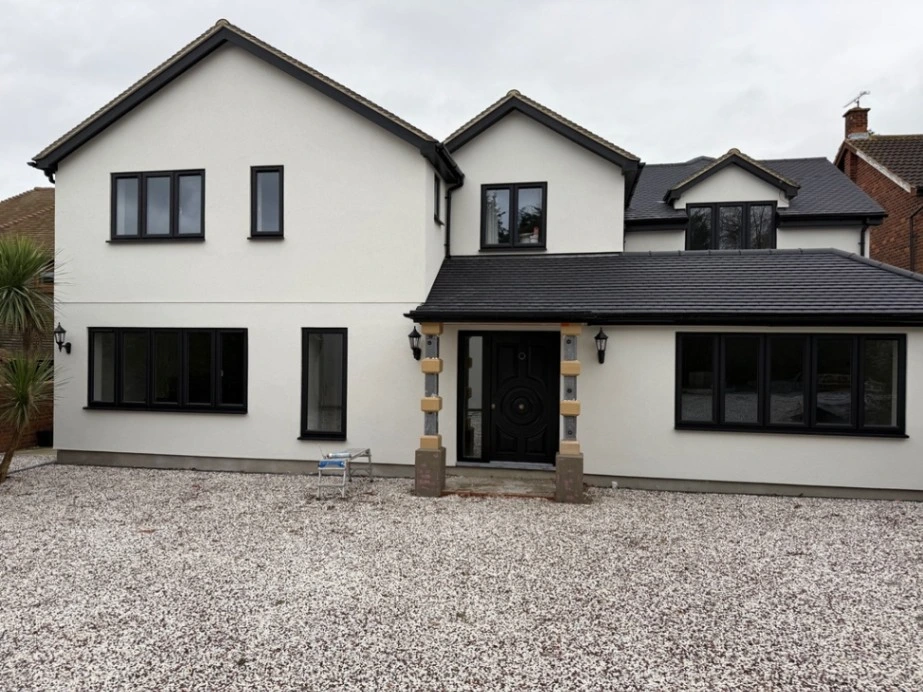Rendered exterior finish after home renovation in Essex